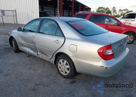 2004 Toyota Camry Le z USA, uszkodzony, nr VIN 4T1BE32K14U884308